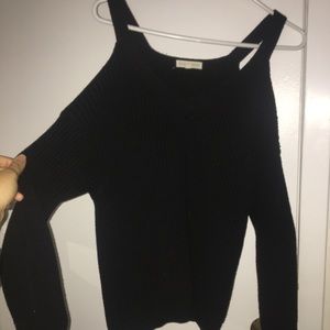 Black sweater with shoulder cutouts